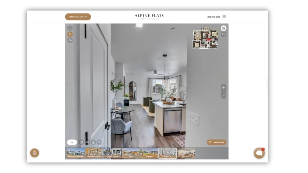 Modern apartment interior with kitchen and living area.