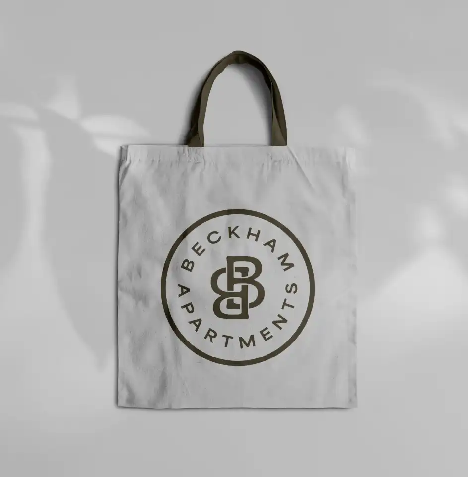 Beckham Apartments logo on a white shopping bag.