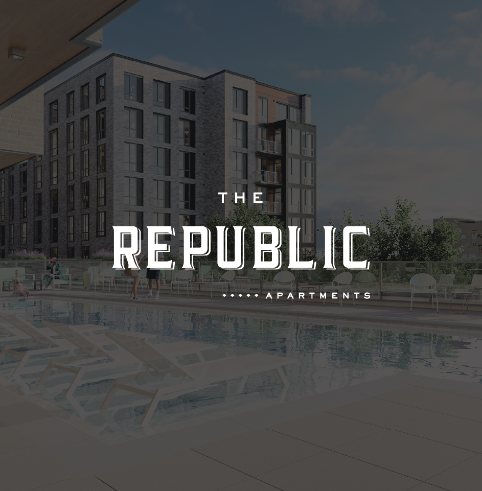 Modern apartment building with a pool view.