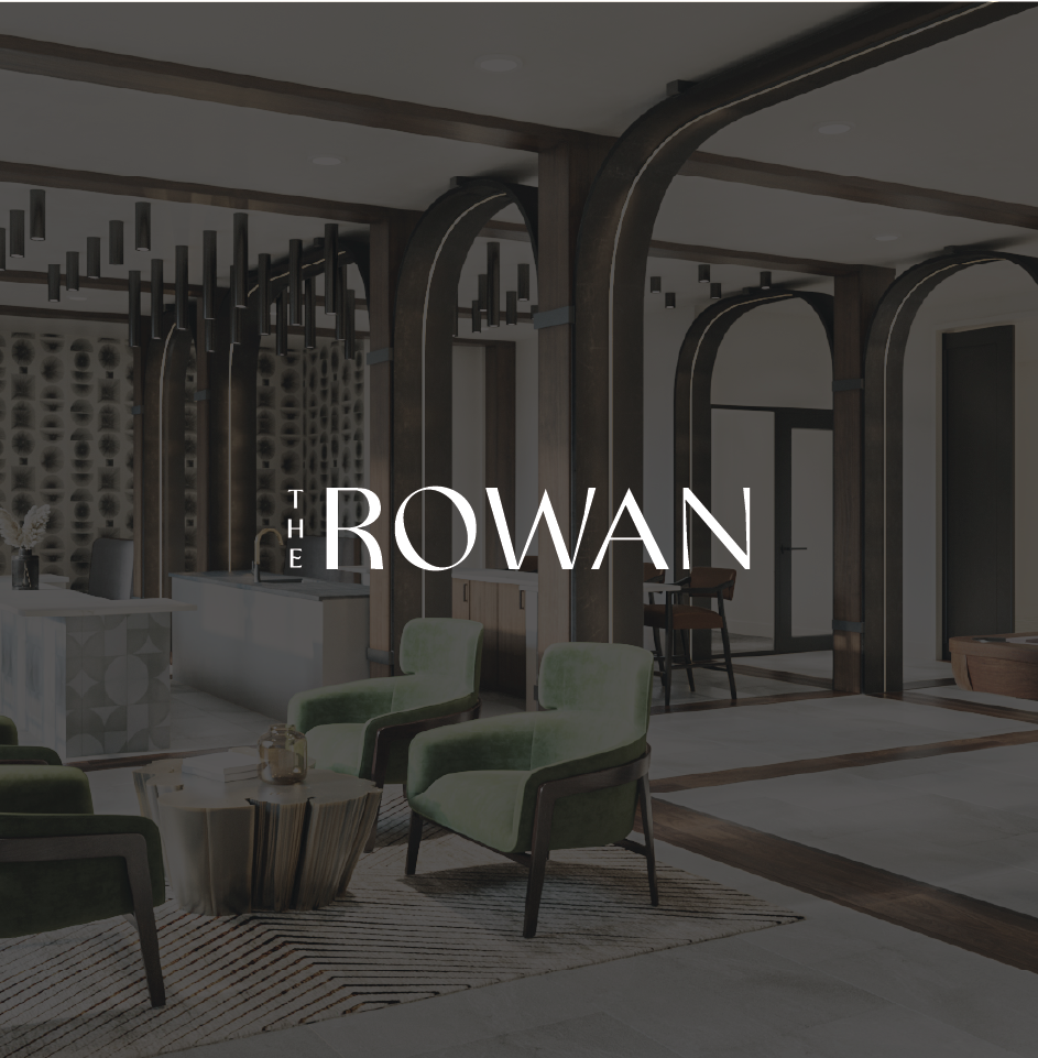 Modern hotel lobby with green chairs.