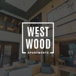 Modern Westwood Apartments lobby with seating area.