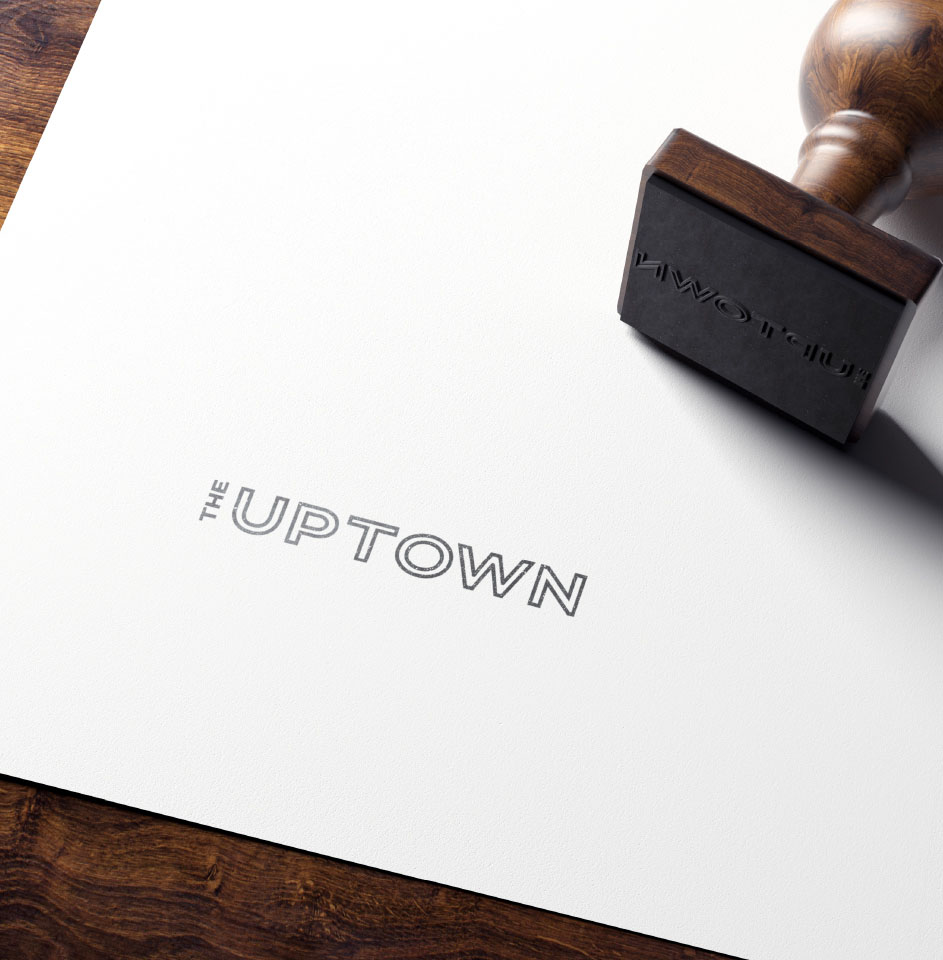 Rubber stamp on paper labeled The Uptown.
